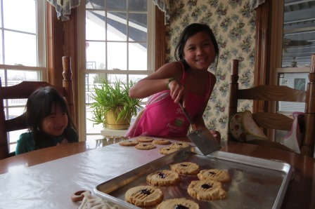 Kasen and Karis making peanut butter cookies